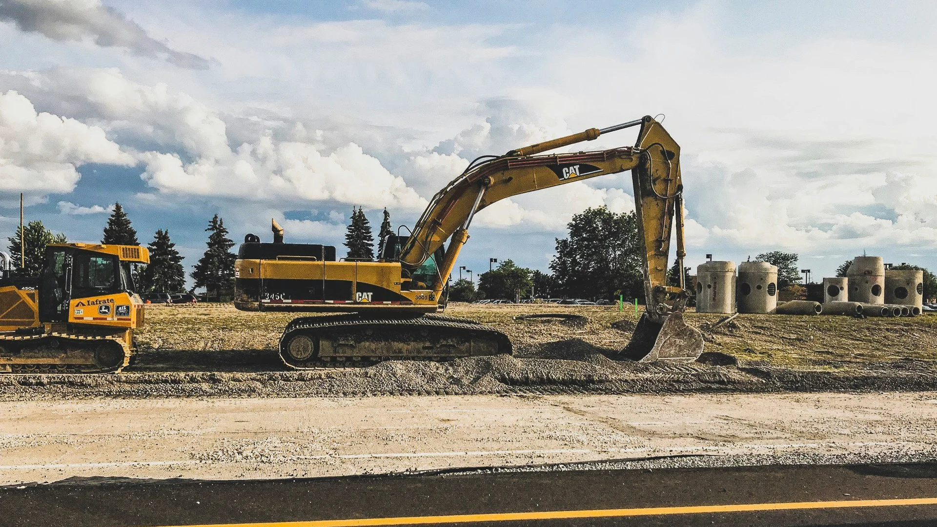 Heavy construction machinery on the side of the road